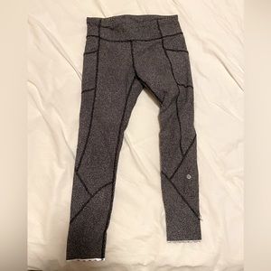Women’s Lululemon leggings in black and white with reflective cuff stripe